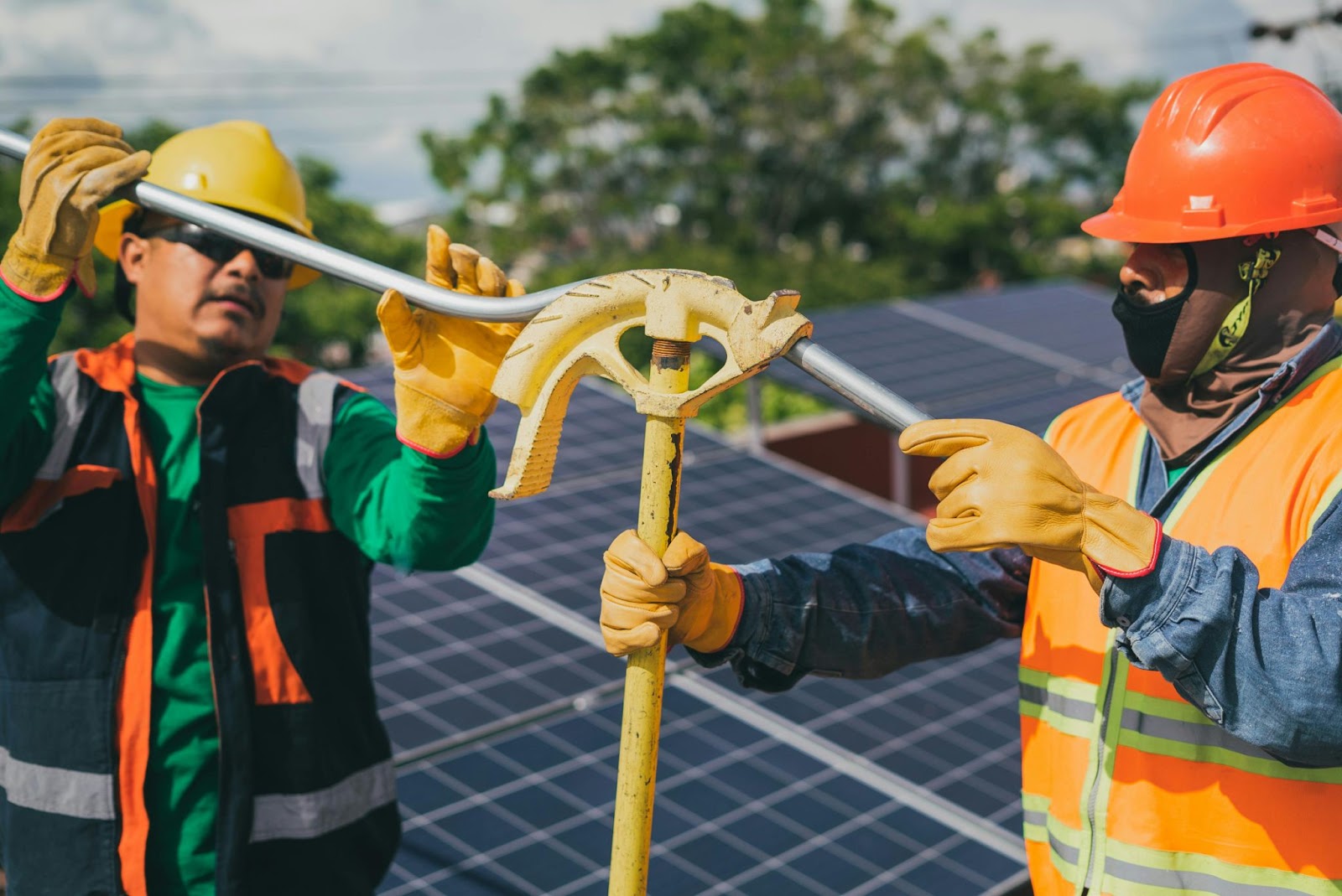 Workmen installing solar panels